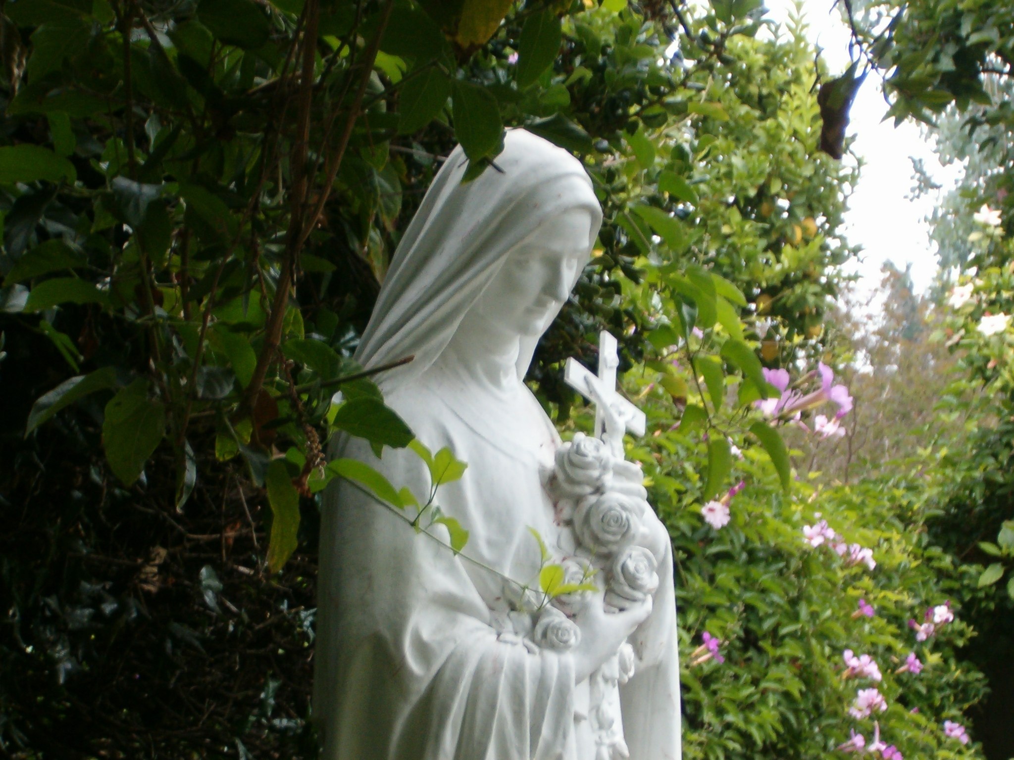 St Therese Statue Garden Statue of St. Therese in nature