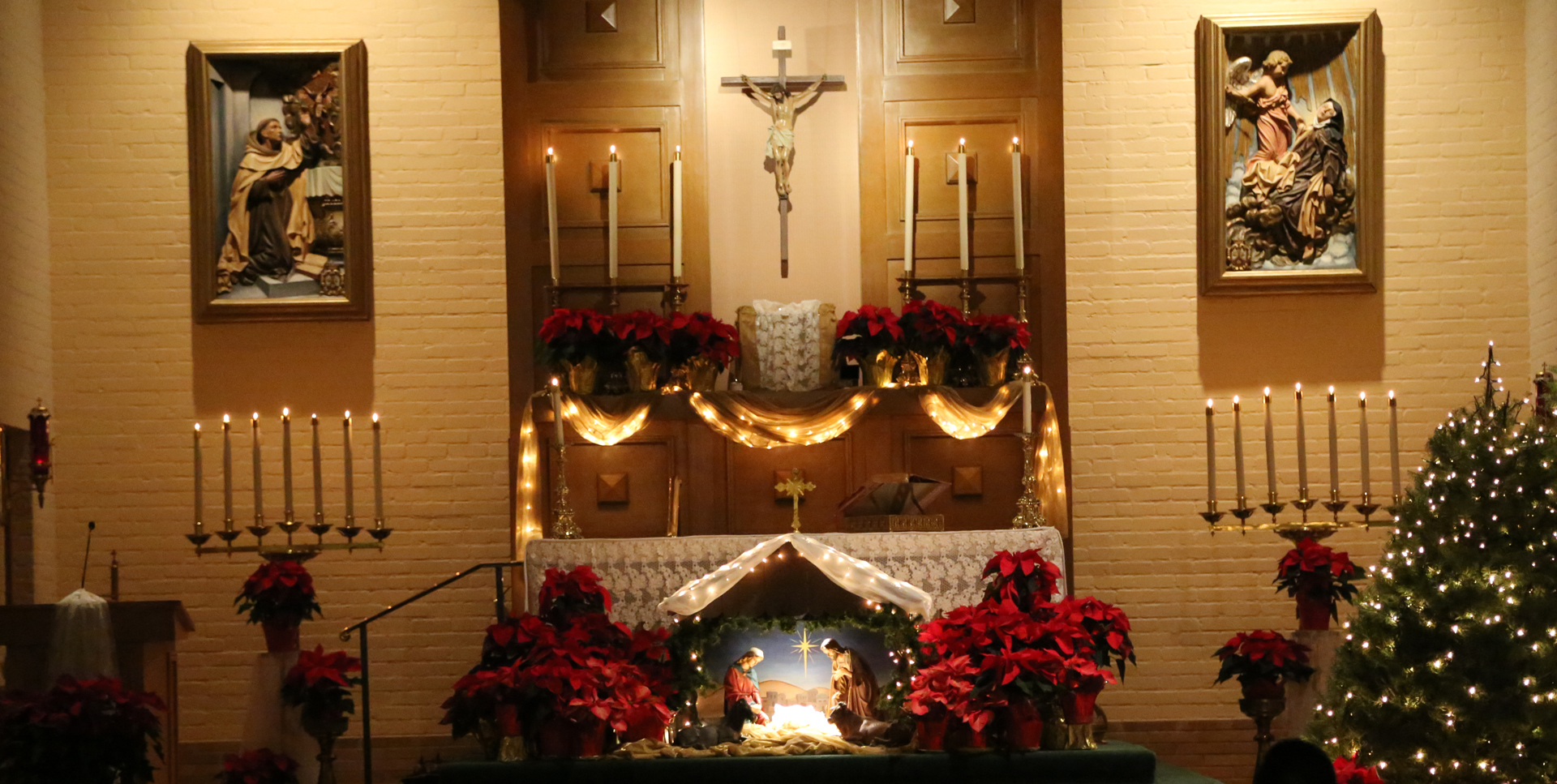 advent altar in chapel with nativity and Christmas decor