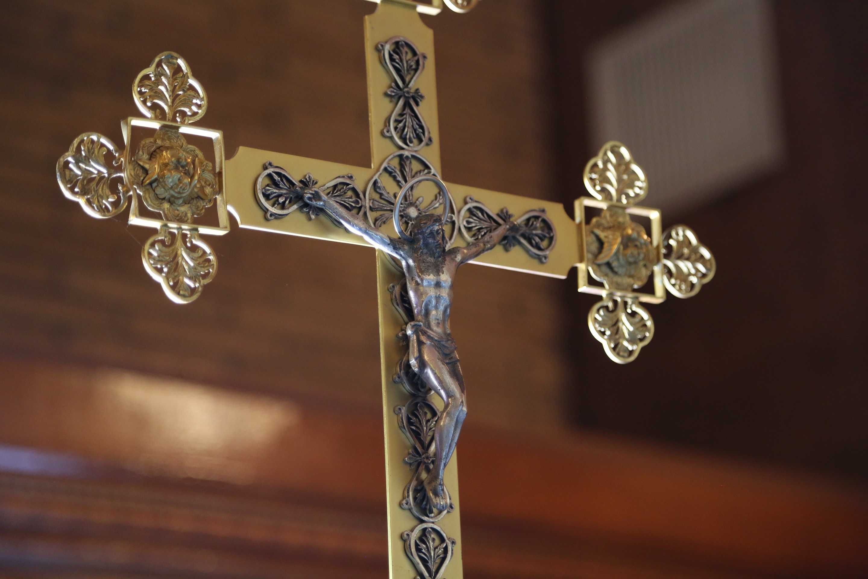 Jesus on gold cross
