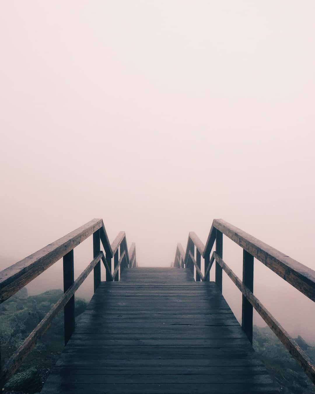 stair case disappearing into fog