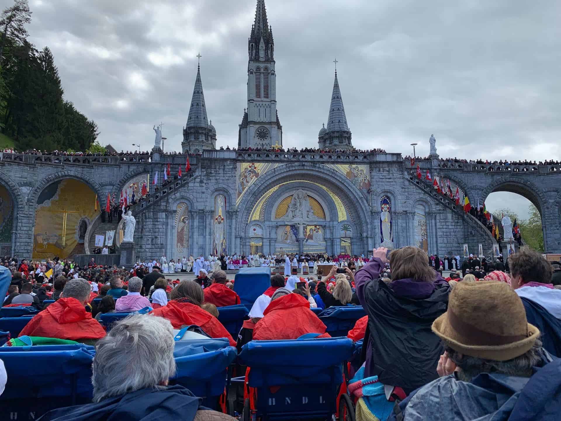 Outside Church in Lourdes with croud infront
