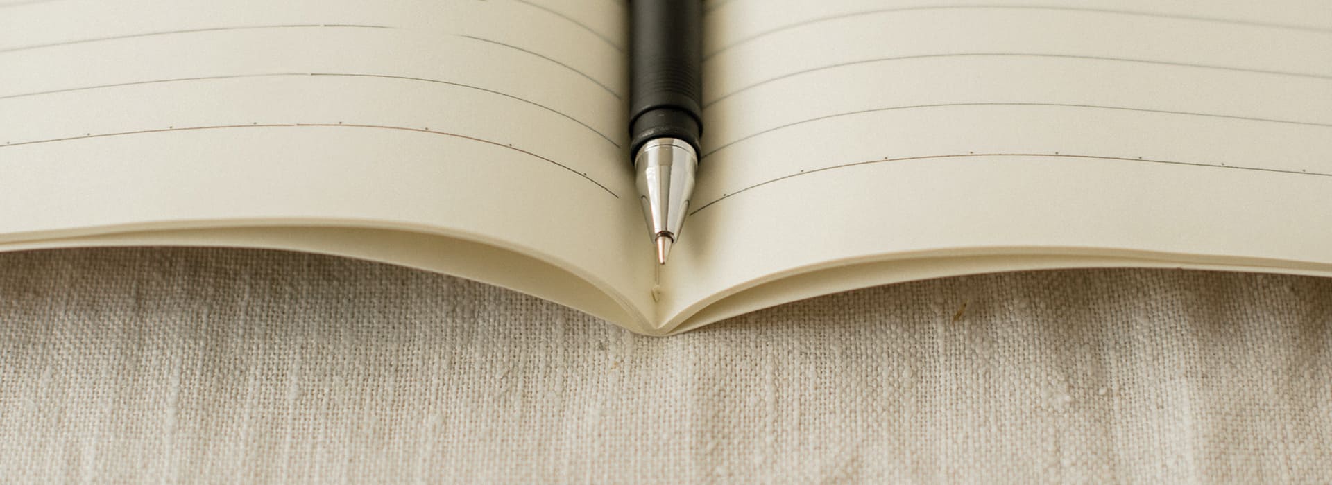 Close up of pen in notebook