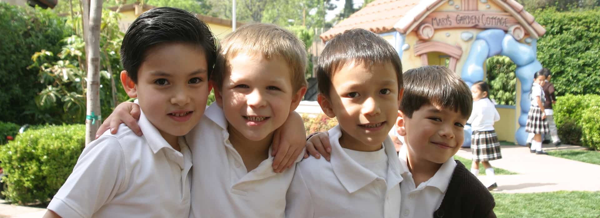 Brothers 4 school boys smiling