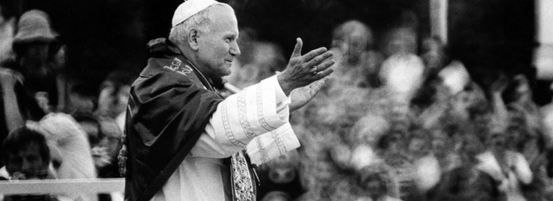 black and white JPII in front of crowd