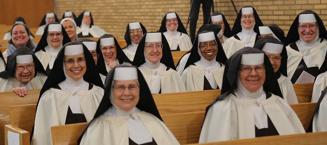 community of Sisters sitting in pews