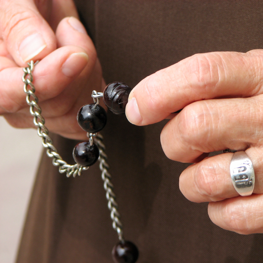 St. Teresa of Avila beholding the child Jesus on the steps of a church.